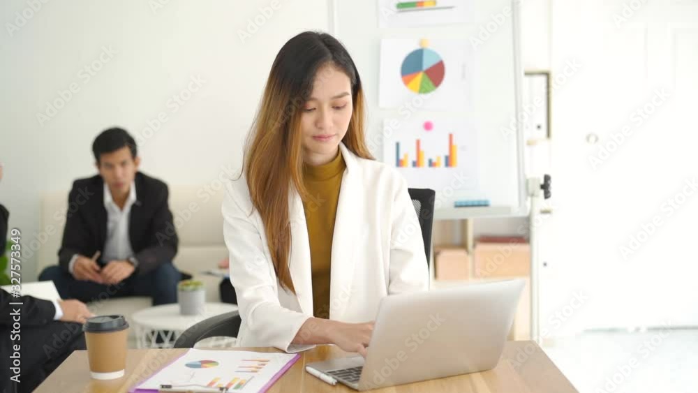 Asian business woman working with laptop Asian business woman working with laptop