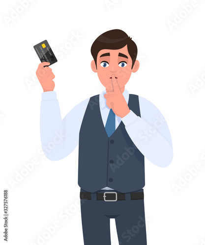 Young businessman showing credit, debit card. Man asking silence and gesturing finger on lips. Sh, shh, keep quiet. Person in vest suit holding ATM card. Male character illustration in vector cartoon.