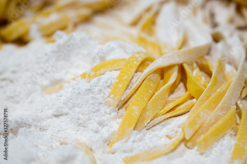 fresh pasta on kitchen table.