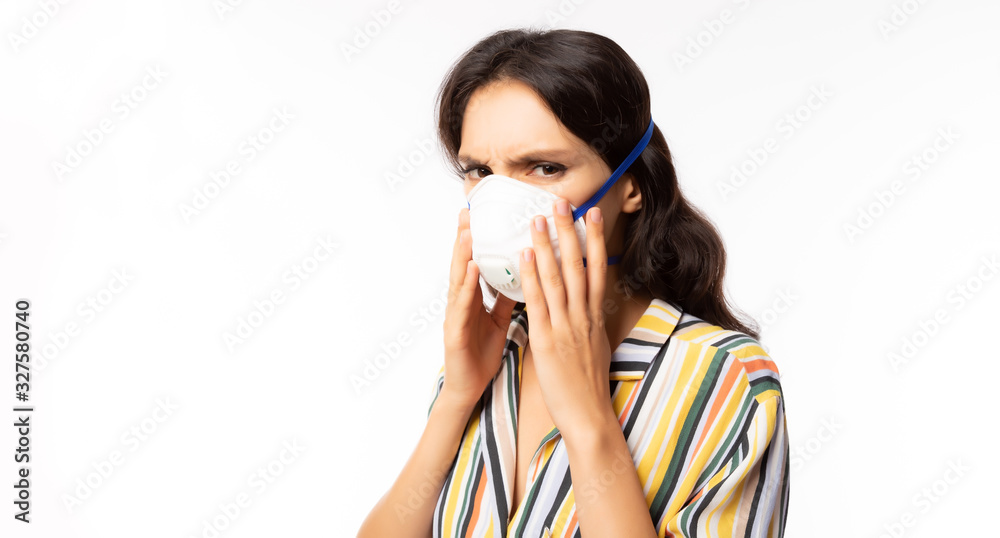 Woman wearing face mask for prevent pm2.5 anti pollution, anti smog, viruses or coronavirus, novid 19. Beautiful girl get stressed from air pollution and pm 2.5 environmental, air pollution concept Woman wearing face mask for prevent pm2.5 anti pollution, anti smog, viruses or coronavirus, novid 19. Beautiful girl get stressed from air pollution and pm 2.5 environmental, air pollution concept