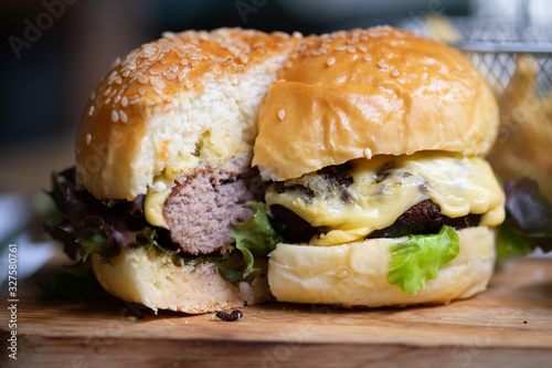 Hamburger with French fries Lettuce and Cheese