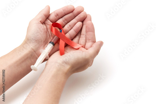 Red ribbon in both hands