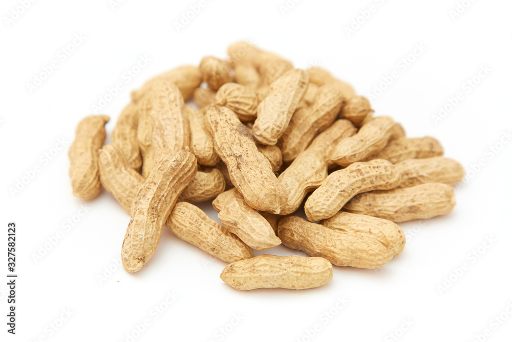 A pile of peanuts in a bamboo basket A pile of peanuts in a bamboo basket