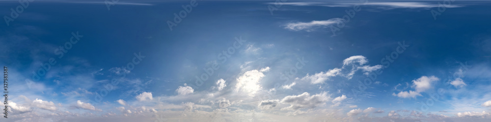 Seamless hdri panorama 360 degrees angle view blue sky with beautiful cumulus clouds with zenith for use in 3d graphics or game development as sky dome or edit drone shot