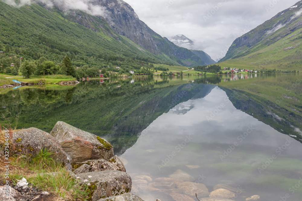 End of fjord. Beautiful Norwegian landscape. view of the fjords. Norway ideal fjord reflection in clear water selective focus