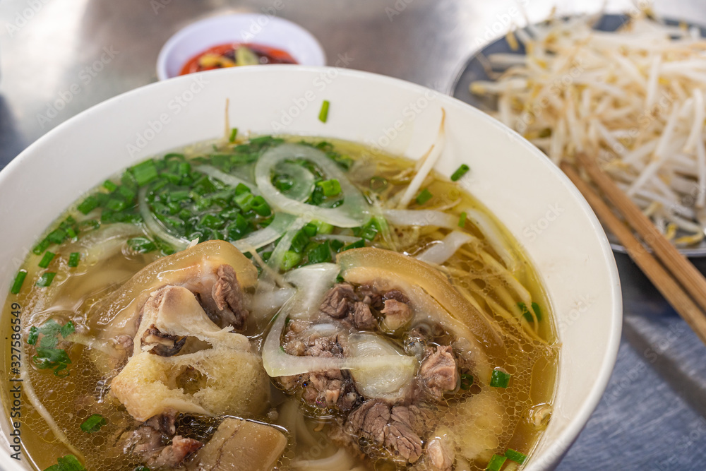 Close up photo of famous Vietnam food - Pho soup noodles Close up photo of famous Vietnam food - Pho soup noodles