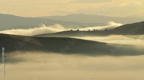 Beautiful fog flowing over mountains