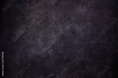 Dark purple grungy backdrop or texture
