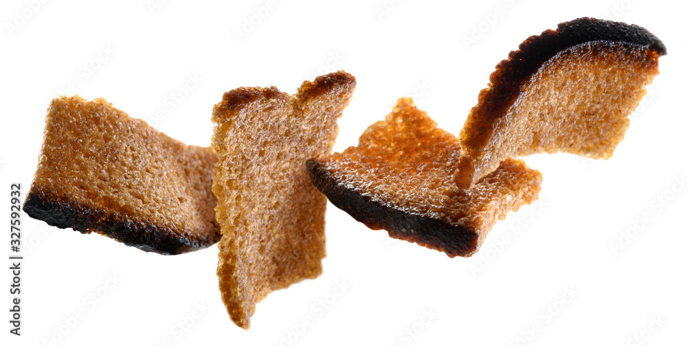 Rye croutons levitate on a white background Rye croutons levitate on a white background