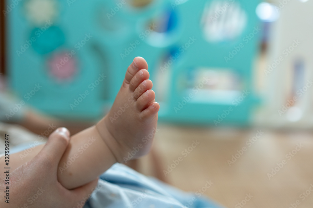 Naklejka premium Close up of sleeping baby's feet