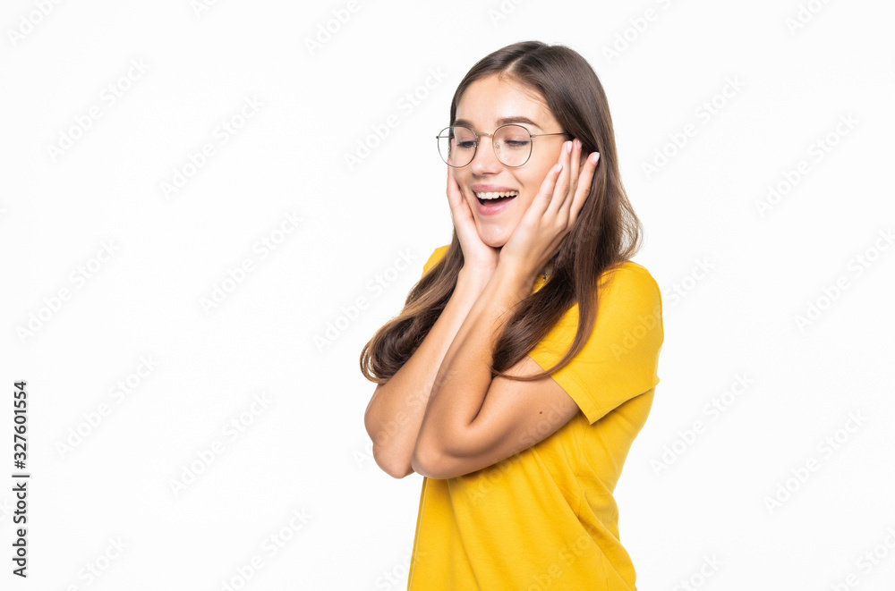 Pleased woman reclines on her hands and looking at the camera over white background Pleased woman reclines on her hands and looking at the camera over white background