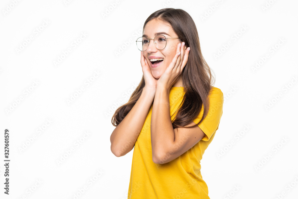 Pleased woman reclines on her hands and looking at the camera over white background Pleased woman reclines on her hands and looking at the camera over white background