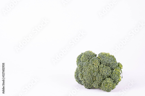 green broccoli lies on a table