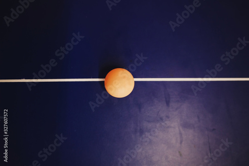 table tennis ball on blue table © jozzeppe777