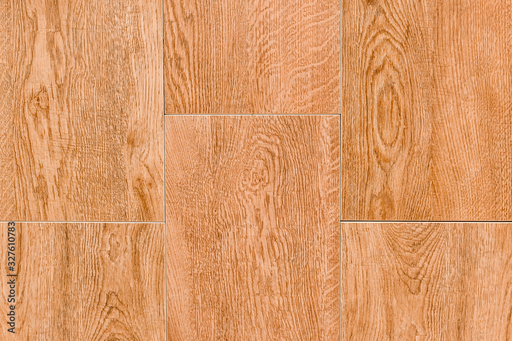 Fototapeta premium Wood texture table orange background with abstract pattern of floor boards, parquet