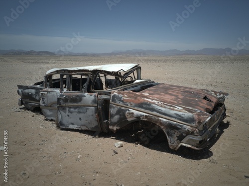 Ford Thunderbird wreck in Namibe Desert photo
