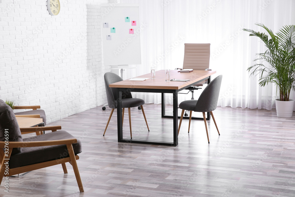 Interior of modern office with table and chairs Interior of modern office with table and chairs