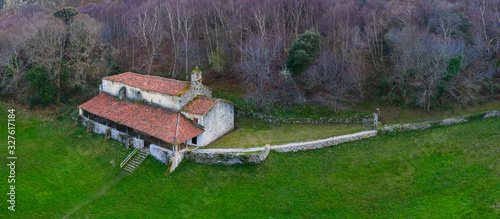 Ermita de San Emeterio, Landscape in the surroundings of the cave of the Pindal, lighthouse and hermitage of San Emeterio, Cantabrian Sea, Asturias, Spain, Europe photo