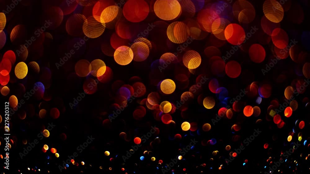 Colorful abstract bokeh lights, subtle and sparkly glowing on a background