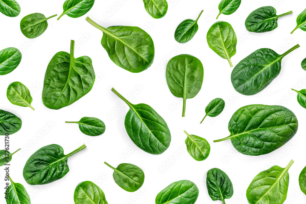 Spinach Pattern. Creative layout made of spinach leaves isolated on white background. Flat lay. Healthy Food concept. - obrazy, fototapety, plakaty 