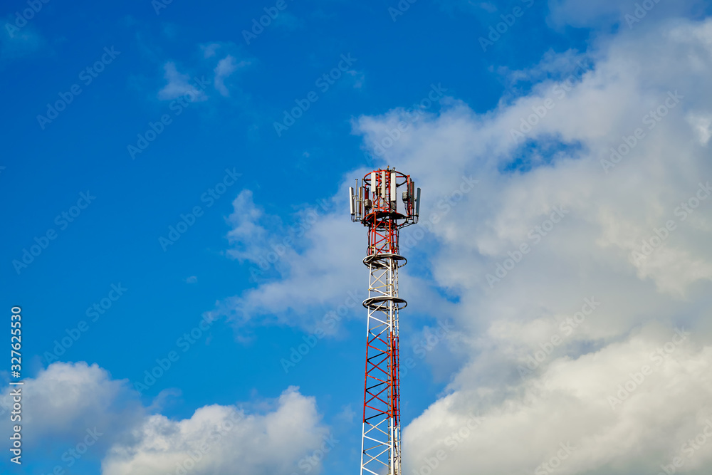 Telecommunication tower with antennas against the sky. Telecommunication tower with antennas against the sky.