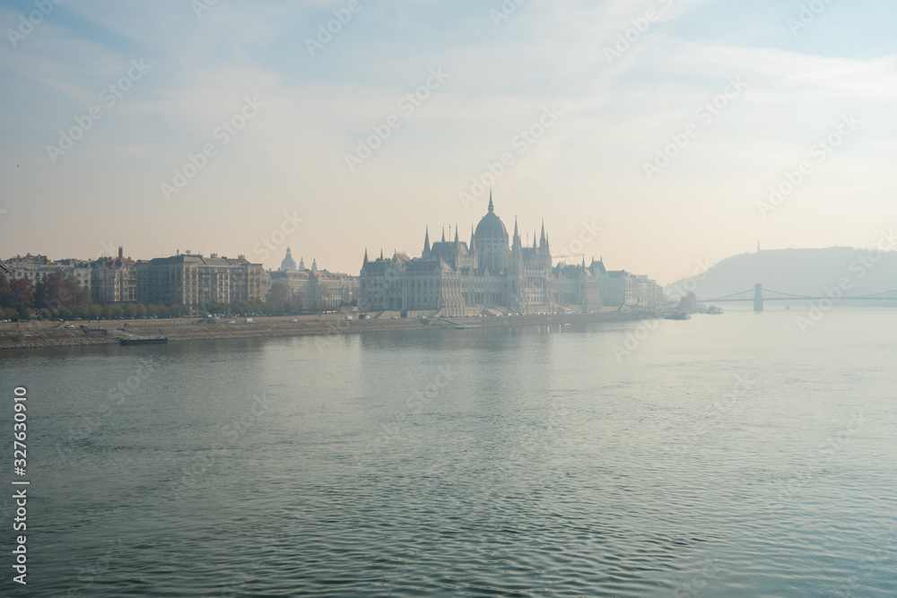 Parliament building and Danube river in the foggy morning, Budapest, Hungary. Parliament building and Danube river in the foggy morning, Budapest, Hungary.