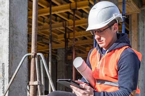 Young architect at a constr...