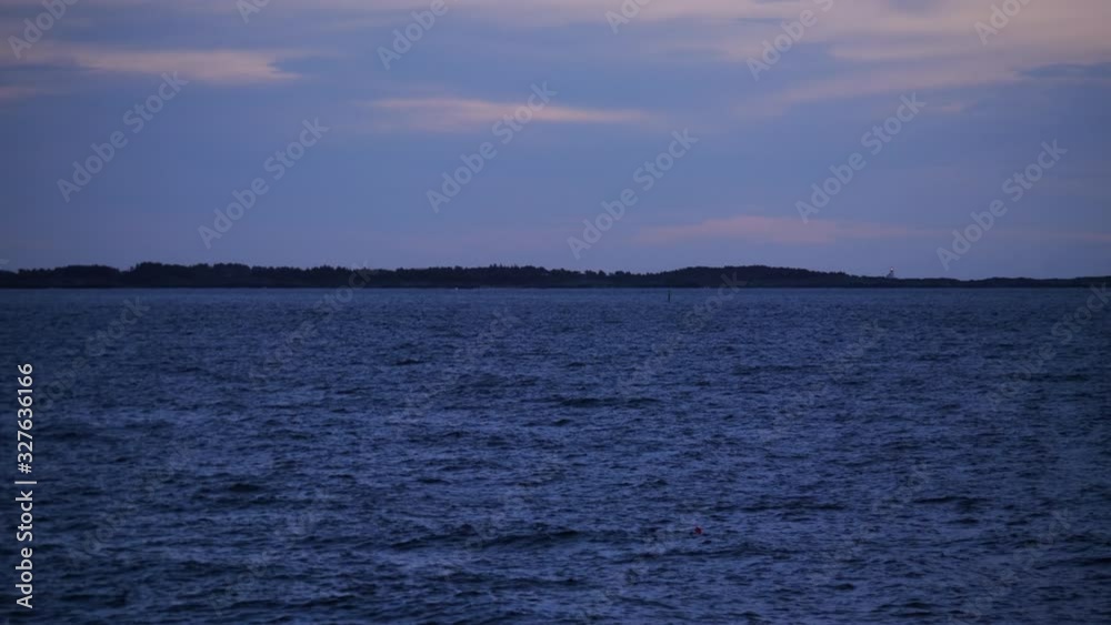 Static shot of calm morning at the Skagerrak sea, in Justoya, Aust-Agder, Norway Static shot of calm morning at the Skagerrak sea, in Justoya, Aust-Agder, Norway