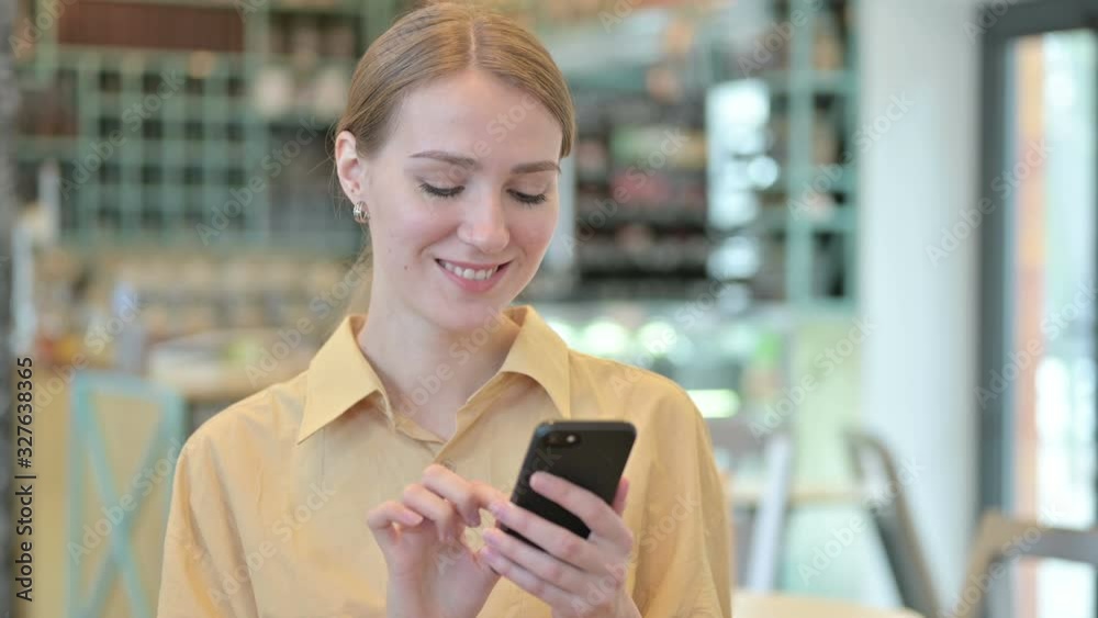 Portrait of Young Woman using Smartphone Portrait of Young Woman using Smartphone