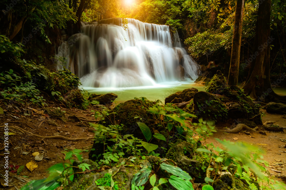 Obraz premium Deep forest waterfall at Erawan waterfall National Park Kanjanaburi Thailand
