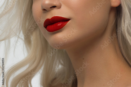 Closeup plump Lips. Lip Care, Fillers. Macro photo with Face detail. Natural shape with perfect contour. Close-up perfect natural lip makeup beautiful female mouth. Plump sexy full red lips