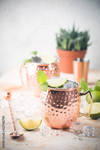 Canvas Print Cold Moscow Mules cocktail with ginger beer, vodka, lime