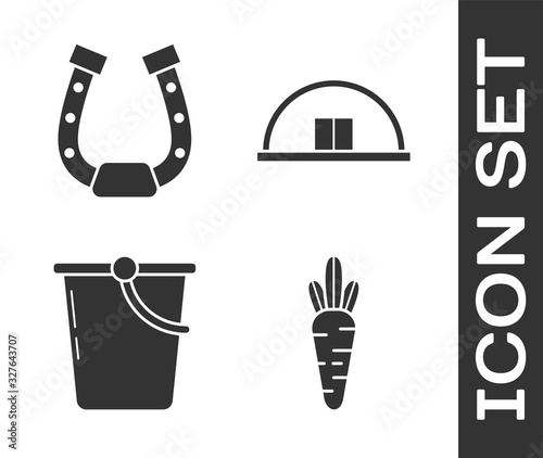 Set Carrot, Horseshoe, Bucket and Hangar icon. Vector