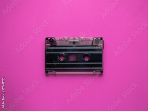Retro cassettes on a pink background. view from above. copy space