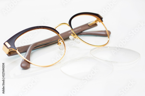 modern fashionable womens glasses for sight. frame and glass on a light background.