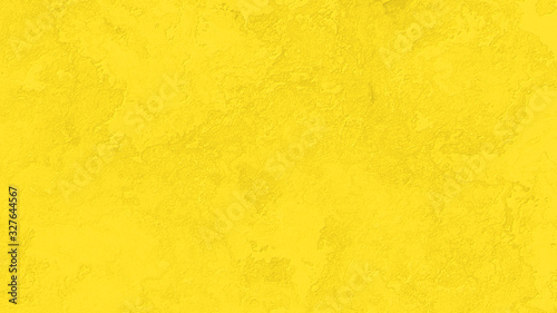 Yellow cement wall texture background.