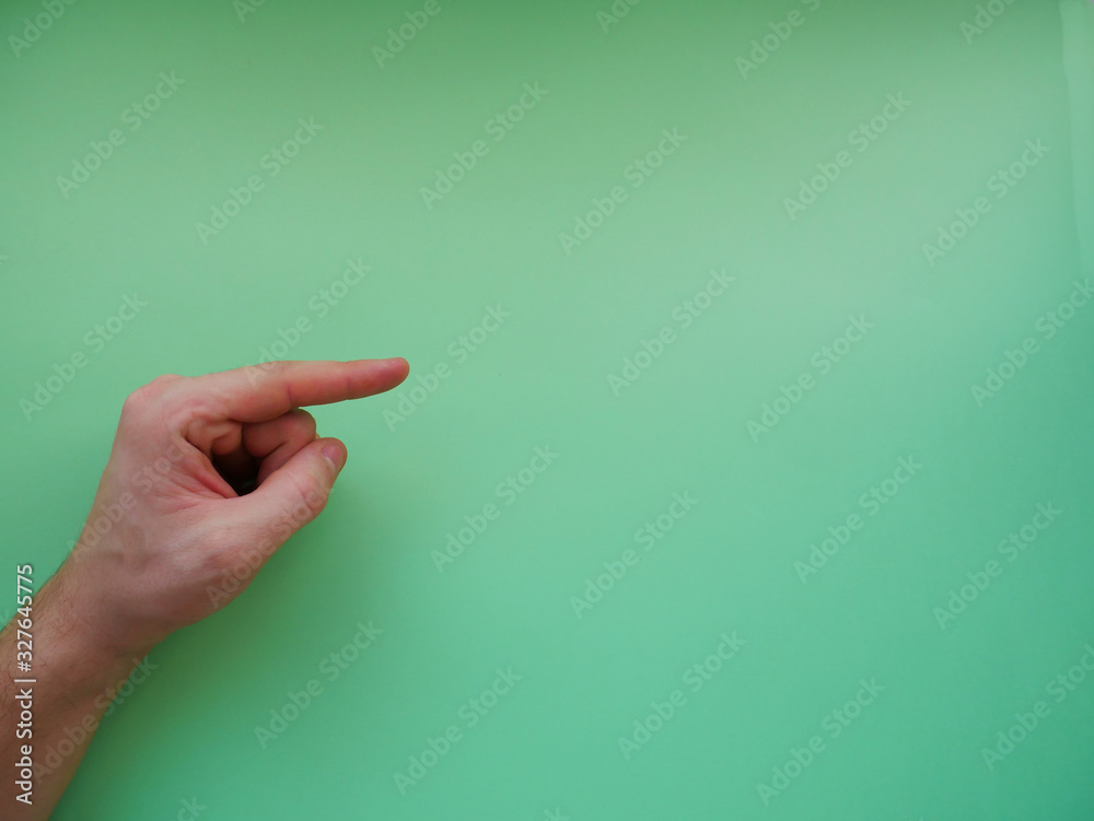 Young woman showing gesture on color background. Space for text Young woman showing gesture on color background. Space for text