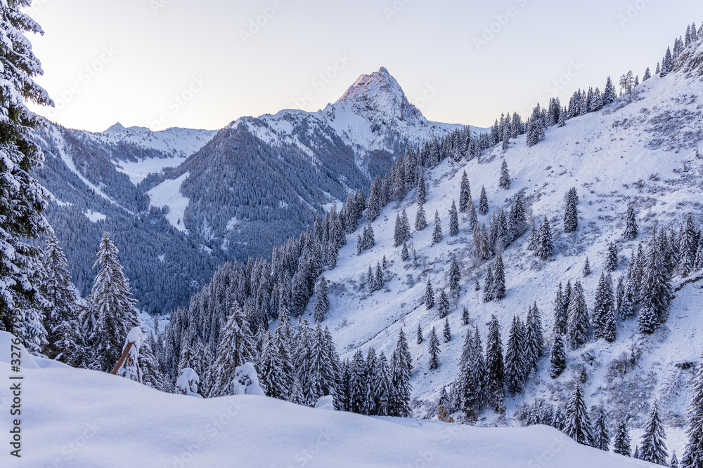 Winter in the Austrian Alps, View of Grosser Rettenstein Mountain in the morning light of a winterday