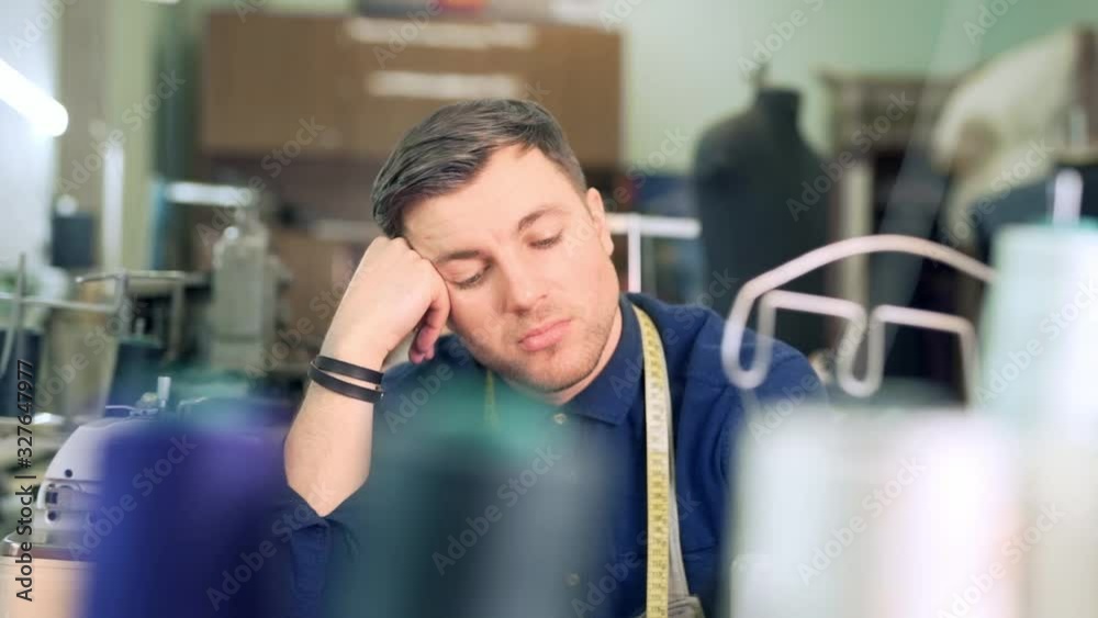 thoughtful designer of clothes in creative depression thoughtful designer of clothes in creative depression