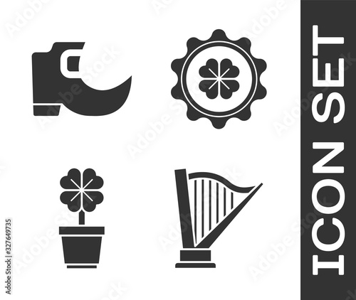 Set Harp, Tradition leprechaun boots, Four leaf clover in pot and Bottle cap with four leaf clover icon. Vector