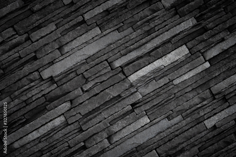 Texture of black brick slate wall, dark grey stone background Texture of black brick slate wall, dark grey stone background