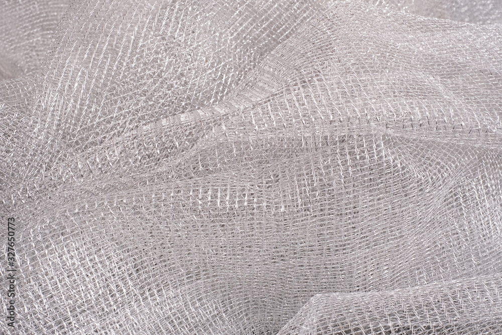 Obraz premium Beautiful silver mesh fabric isolated