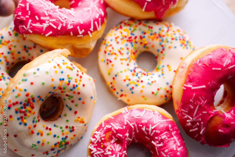 donuts with icing isolated on white background donuts with icing isolated on white background