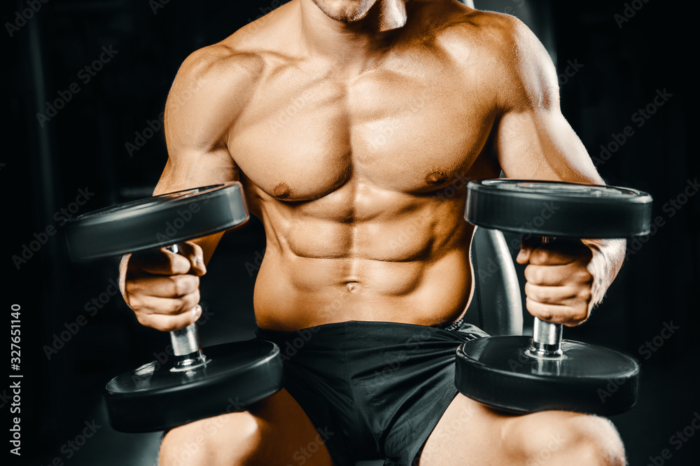 Naklejka premium Bodybuilder athletic man workout muscles exercise.