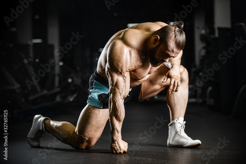 Bodybuilder athletic man workout muscles exercise.