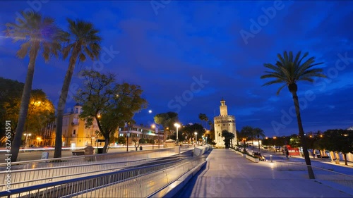 Torre del Oro Sunset Timelapse 4k in Seville Spain City Center with Tourists Visiting the City.