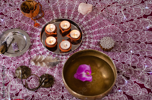 Set with Ayurvedic symbols of the five elements of nature and tibetan singing bowls. Composition of esoteric objects, yoga used for healing, meditation, relaxation and purifying. Aromatherapy. photo