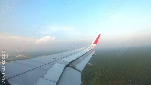 Time Lapse Of Airplane Landing From Airlane Window.4K