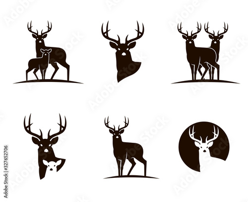 collection of emblems with black deer isolated on white background photo