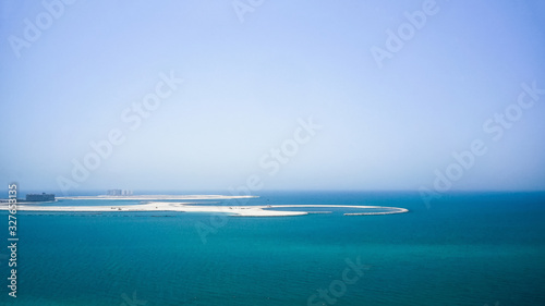 The construction of the artificial Islands of Palm Jumeirah in the Arabian Gulf. Dubai. photo